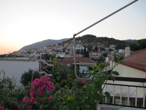 a view of a city from the roof of a house at NICK STUDIOS previous NICK HOUSE in Plomarion