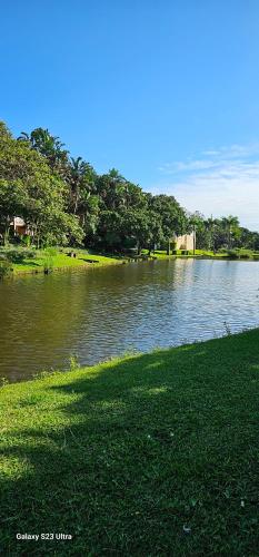 a body of water with grass and trees in the background at 44 Montego Bay Caribbean Estates in Port Edward
