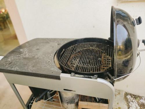 a grill sitting on top of a table at Emplacement idéal dans le Var ! in Cuers