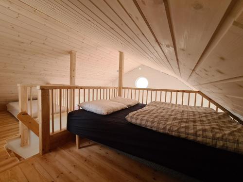 Postel nebo postele na pokoji v ubytování Nysted Strand Camping & Cottages