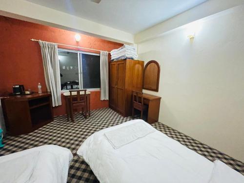 Ένα ή περισσότερα κρεβάτια σε δωμάτιο στο Hotel Vibe by Solitary