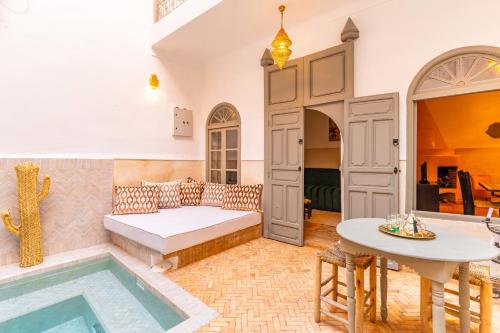 Ένα ή περισσότερα κρεβάτια σε δωμάτιο στο Riad Coco Marrakech