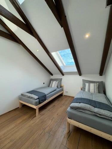 Ένα ή περισσότερα κρεβάτια σε δωμάτιο στο Juwel am Stadtrand von Wien