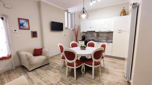 TV a/nebo společenská místnost v ubytování Casa Vacanze Il Piccolo Viaggiatore