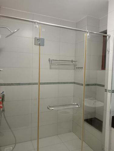 a shower with a glass door in a bathroom at Sultan palace. in Mombasa