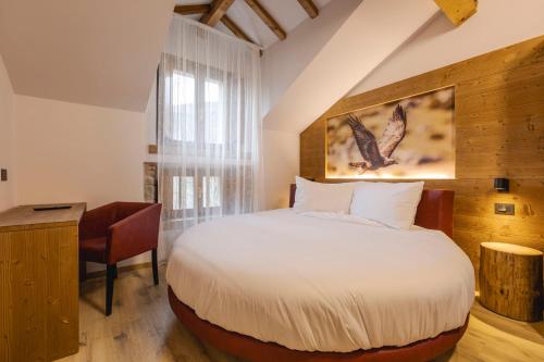 Postel nebo postele na pokoji v ubytování Granduca Mountain Wellness Apartments Campigna