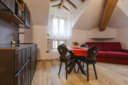 Kuchyň nebo kuchyňský kout v ubytování Granduca Mountain Wellness Apartments Campigna