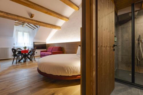 Postel nebo postele na pokoji v ubytování Granduca Mountain Wellness Apartments Campigna