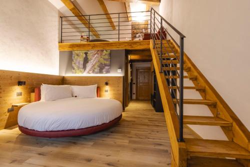 Postel nebo postele na pokoji v ubytování Granduca Mountain Wellness Apartments Campigna