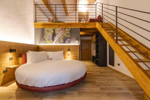 Postel nebo postele na pokoji v ubytování Granduca Mountain Wellness Apartments Campigna