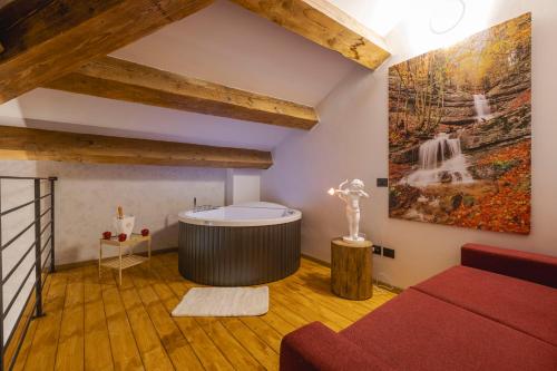 Postel nebo postele na pokoji v ubytování Granduca Mountain Wellness Apartments Campigna