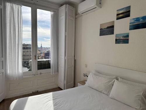 Postel nebo postele na pokoji v ubytování Guest House Éxito en Madrid