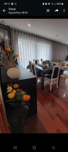 Χώρος καθιστικού στο duplex de luxo haut standing bord de plage avec piscine privée chauffée intérieurs
