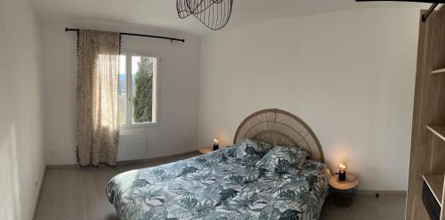Katil atau katil-katil dalam bilik di Appartement cosy