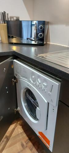 Köök või kööginurk majutusasutuses City Apartment in Great Location with a Balcony & Parking Possible - West One