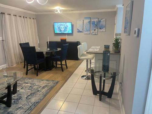 a dining room with a table and chairs at Mountain Creek Condo, Chic, comfy Vernon NJ in Vernon Township