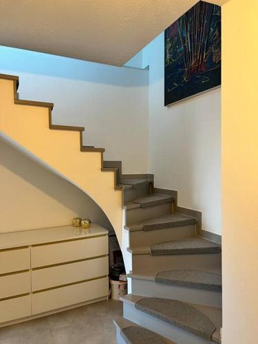 a stairway in a house with a stair case at Maisonette Wohnung Frechen City in Frechen