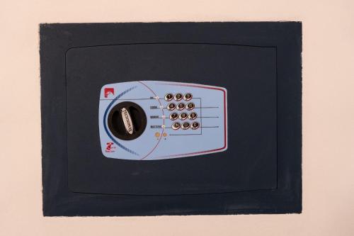 a drawing of a toaster oven in a black frame at Festival's Home in Sanremo