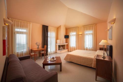 Postel nebo postele na pokoji v ubytování Armonia Resort