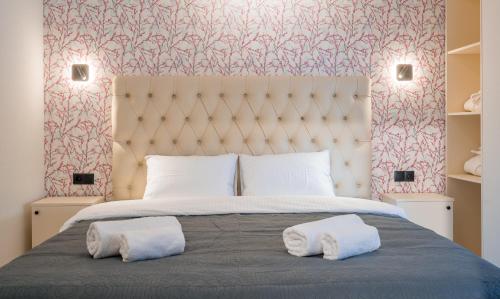 Postel nebo postele na pokoji v ubytování Luxury X By Umbrella