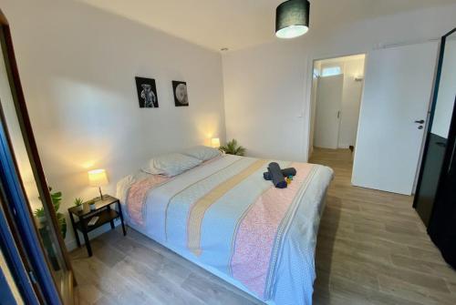 מיטה או מיטות בחדר ב-Le Carmen - terrace - garage