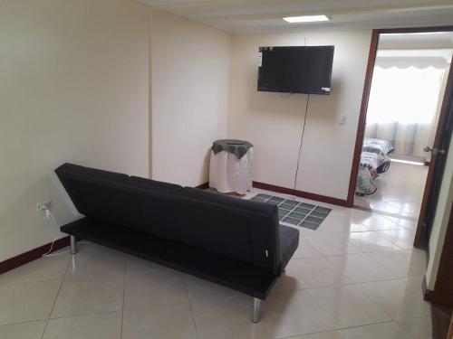 TV a/nebo společenská místnost v ubytování Casa de Ensueño en Filandia: Tu Hogar Lejos de Casa