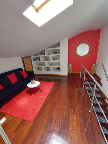 Ένα ή περισσότερα κρεβάτια σε δωμάτιο στο duplex de luxo haut standing bord de plage avec piscine privée chauffée intérieurs