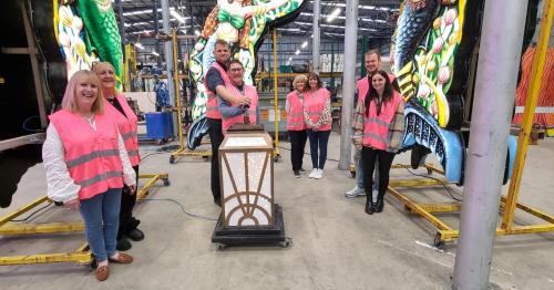 a group of people standing in a factory at Newholme Hotel in Blackpool