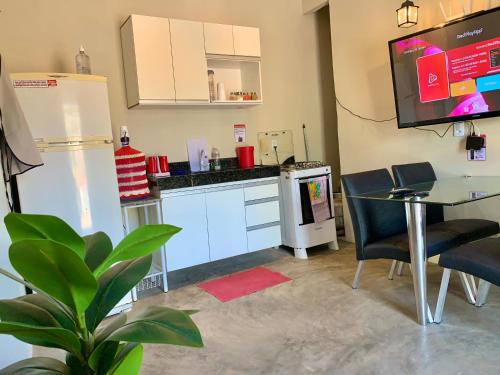 Nhà bếp/bếp nhỏ tại L2 Localize casa na praia pontal
