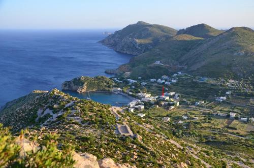 an aerial view of a small town on a mountain at Emporios Bay Hotel Chios in Emporeios