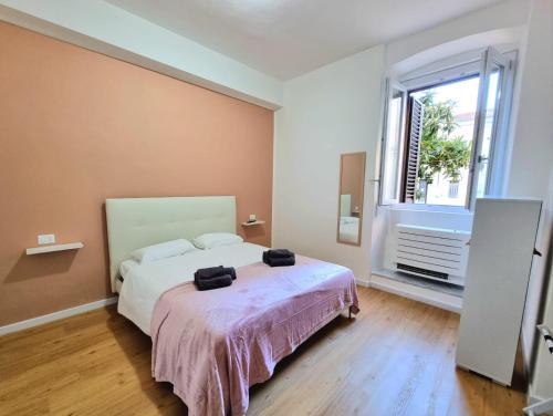 Postel nebo postele na pokoji v ubytování Morfeo B&B