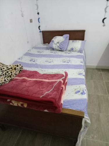 מיטה או מיטות בחדר ב-Weza