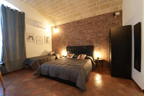CASA FELICE Maison de Charmeにあるベッド