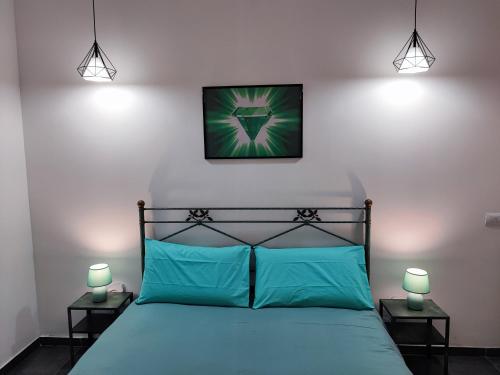 Ένα ή περισσότερα κρεβάτια σε δωμάτιο στο A&C WHITE DIAMOND con larga terrazza di 50 mq sul mare