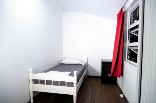 Een bed of bedden in een kamer bij Rena’s Appartement
