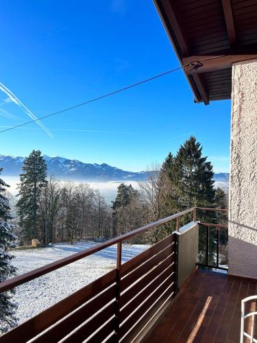 a balcony with a view of the mountains at Apartment - Über den Wolken in Batschuns