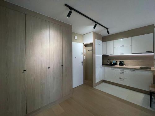 Η κουζίνα ή μικρή κουζίνα στο 4UApart-Apartment suite Amour