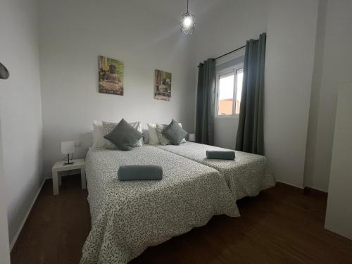 Postel nebo postele na pokoji v ubytování Casa Daniel
