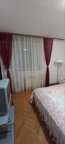 Lova arba lovos apgyvendinimo įstaigoje Apartment Milan