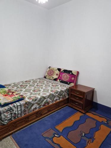 Tempat tidur dalam kamar di DAR yous