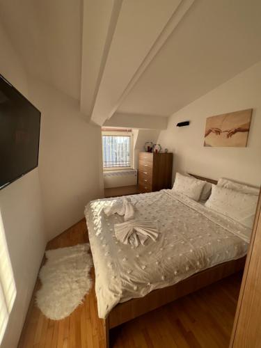 Postel nebo postele na pokoji v ubytování Cozy Oasis