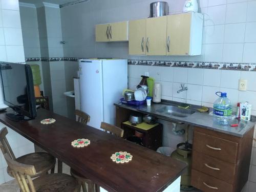 Una cocina o kitchenette en Carnaval Inn Salvador