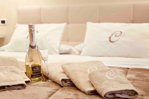 Ένα ή περισσότερα κρεβάτια σε δωμάτιο στο Il tempo di un Caffè