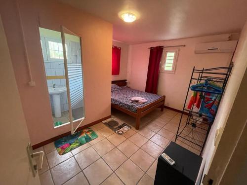 Postel nebo postele na pokoji v ubytování Villa yoyo poirier