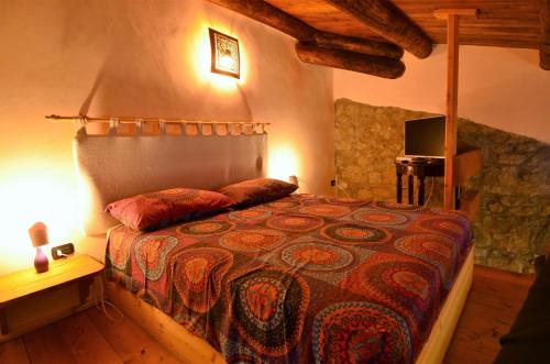 a bedroom with a bed in a room at Panoramic villa with pool in Bolsena