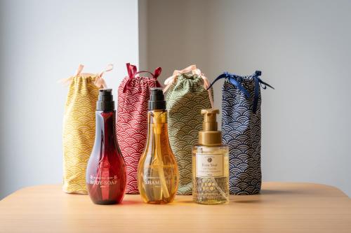 a group of wine bottles sitting on a table at 禾淞津別邸 Kashotsu Bettei in Taichung