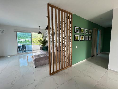 Posezení v ubytování Penthouse + Jacuzzi privado en Anapoima.