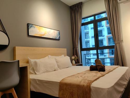 a bedroom with a bed and a large window at Near Airport K Avenue Family Room in Donggongon