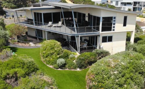 an aerial view of a house with a yard at Saudade Margaret River in Margaret River Town