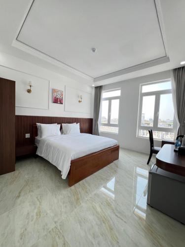 Cama o camas de una habitación en Paris Hotel Châu Đốc
